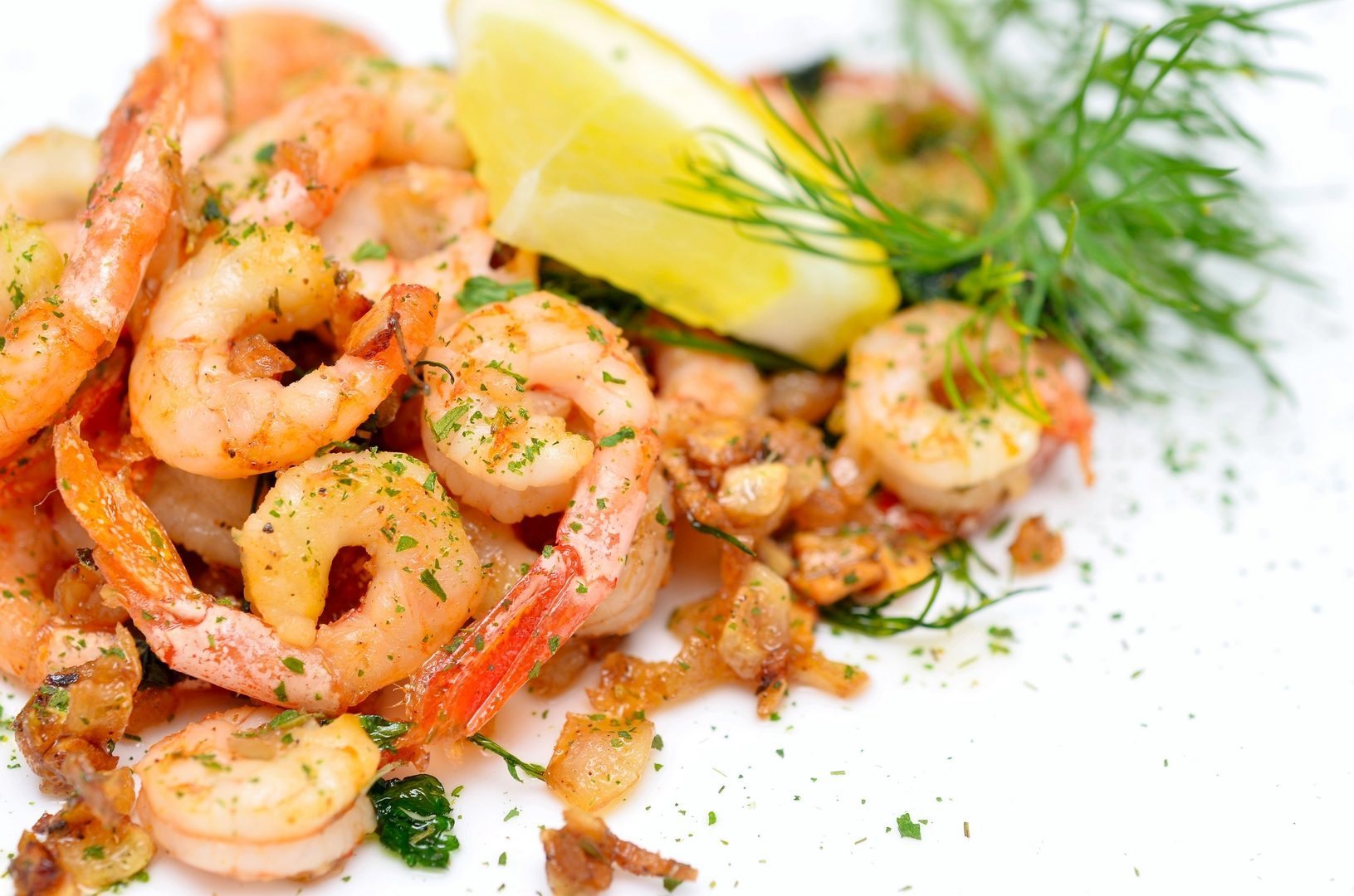 fried shrimps with garlic and fresh dill