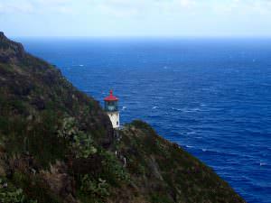 Historic Makap'uu Point Light (Makapu'u Lighthouse) on cliffside of the island of Oahu with view of Pacific Ocean. It has the largest lens of any lighthouse in the United States. 2015.