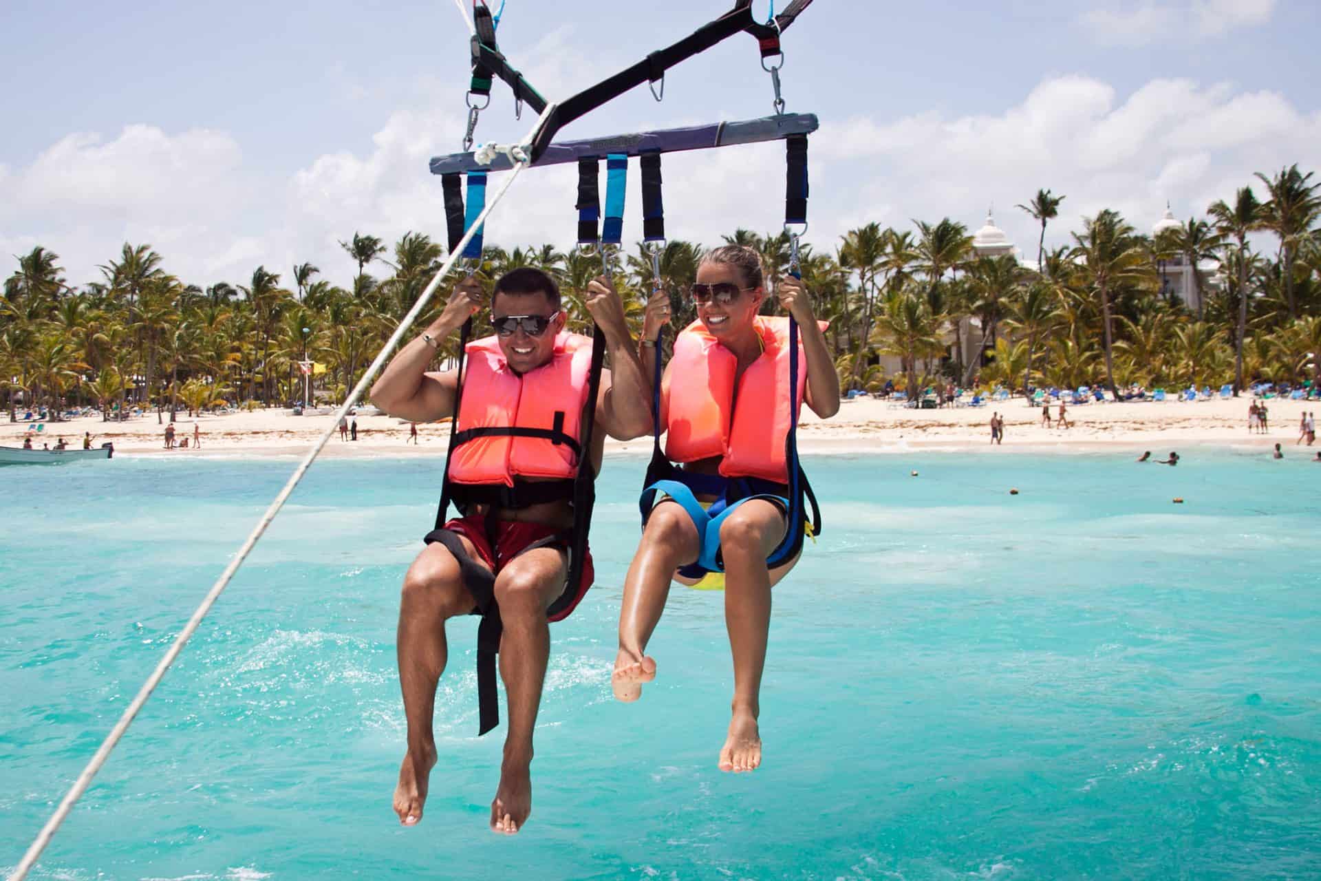a couple parasailing in hawaii
